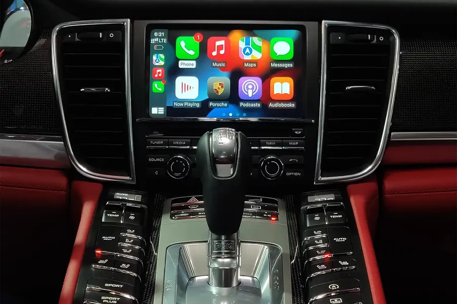 CarPlay display with a factory-style frame